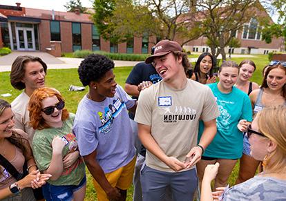 Group of students laughing.